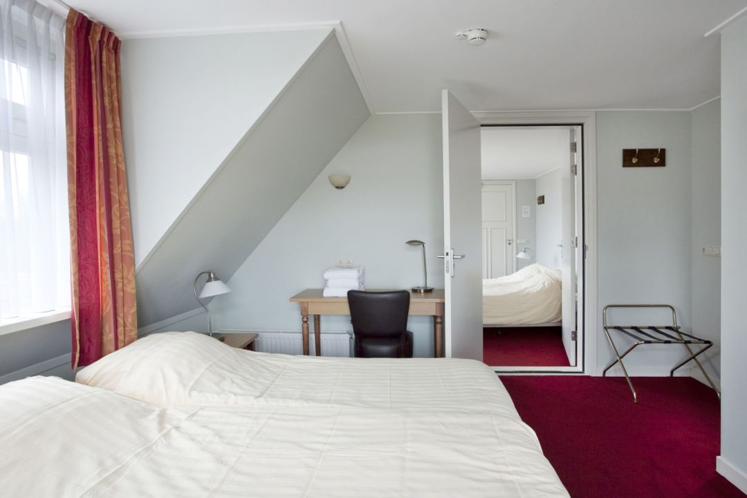van der Werff - hotel room with shower/toilet
