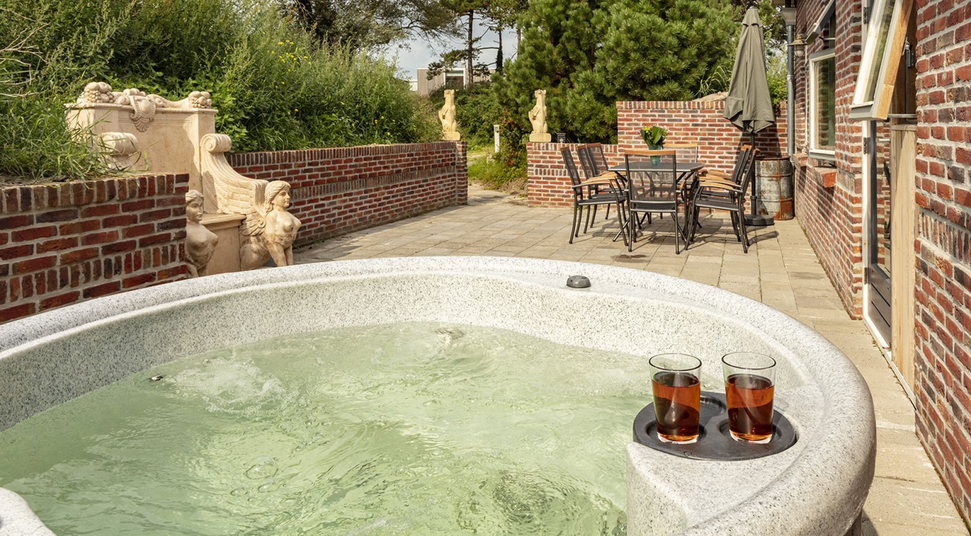 Soaking in the jacuzzi at a dune-side apartment