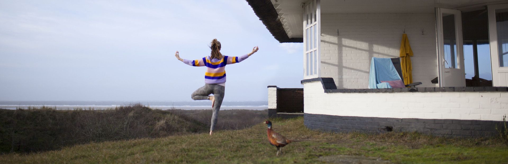 Yoga in the dunes with a sea view on Schiermonnikoog